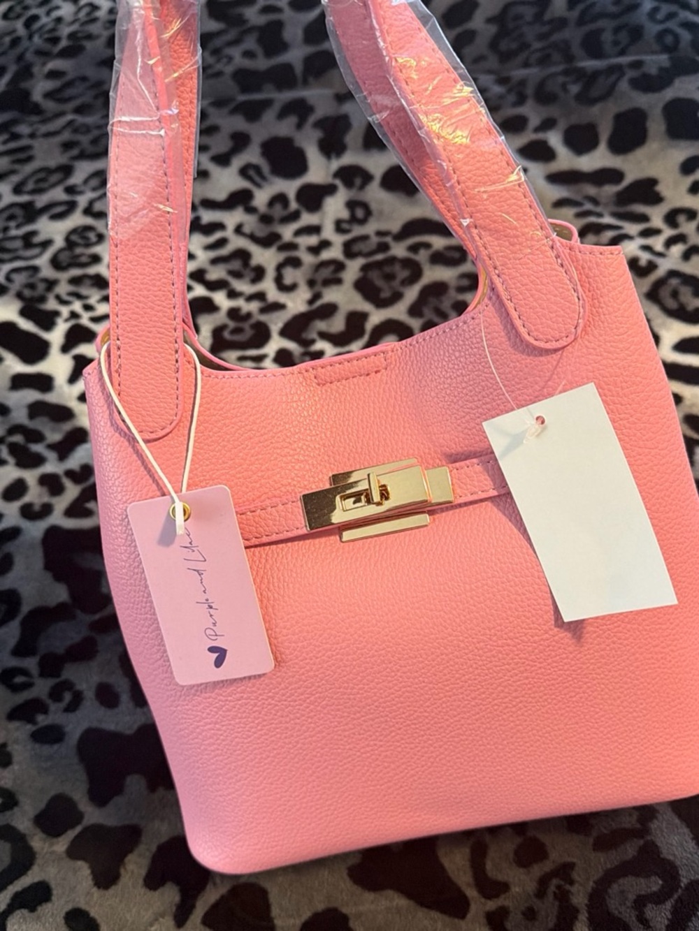 Stylish Pink Shoulder Bag with Gold-Tone Closure